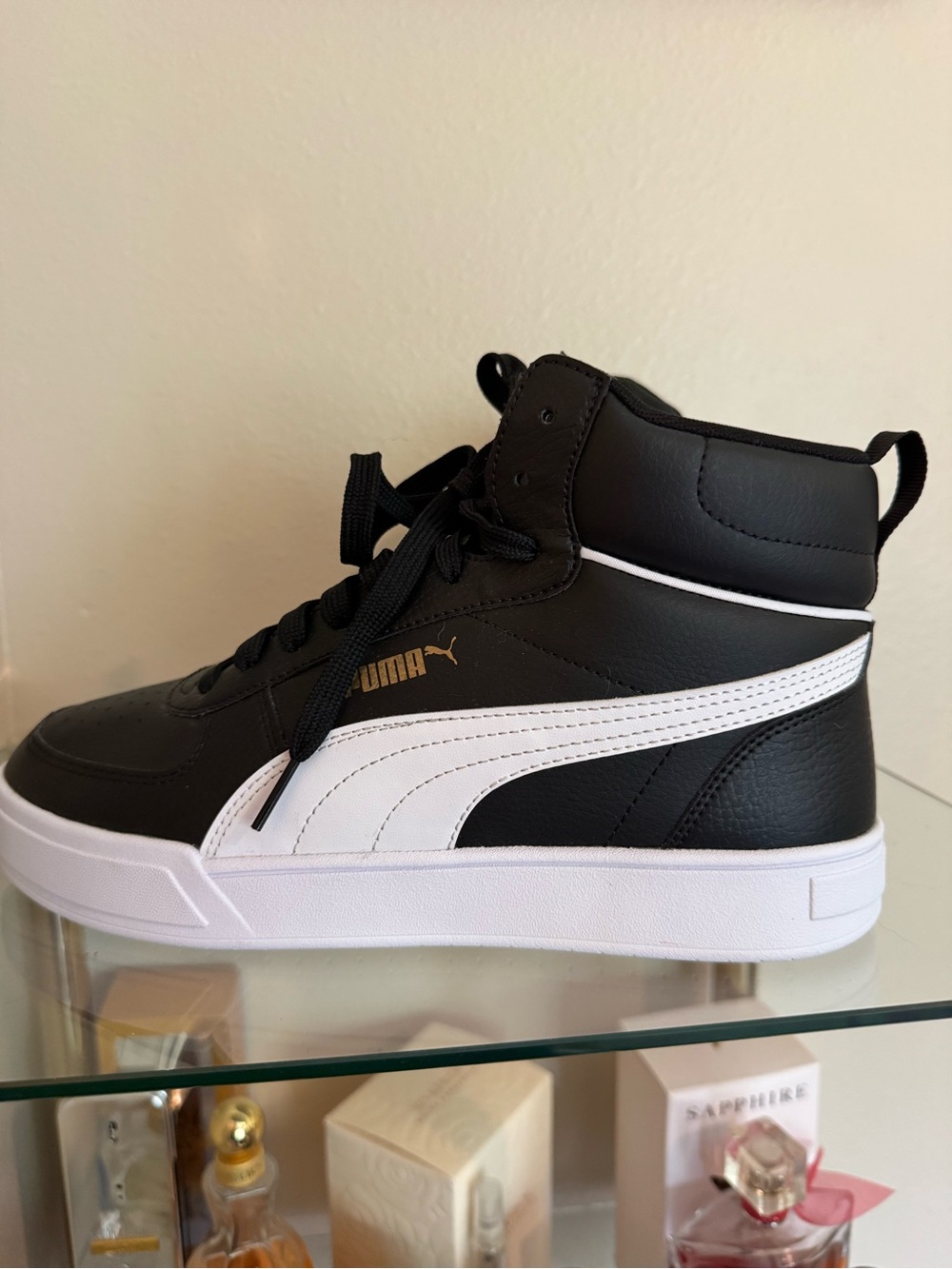 Puma Black and White High-Top Sneakers with Gold Logo